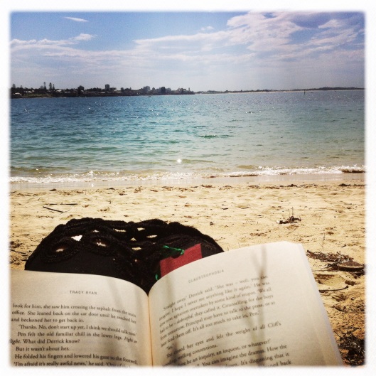 12 reading on the beach
